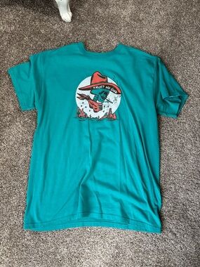 Teal Graphic Tee with 'Trust No One' Moon Rider